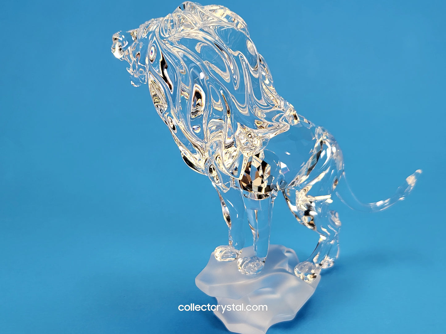 SWAROVSKI LION STANDING ON A ROCK 269377