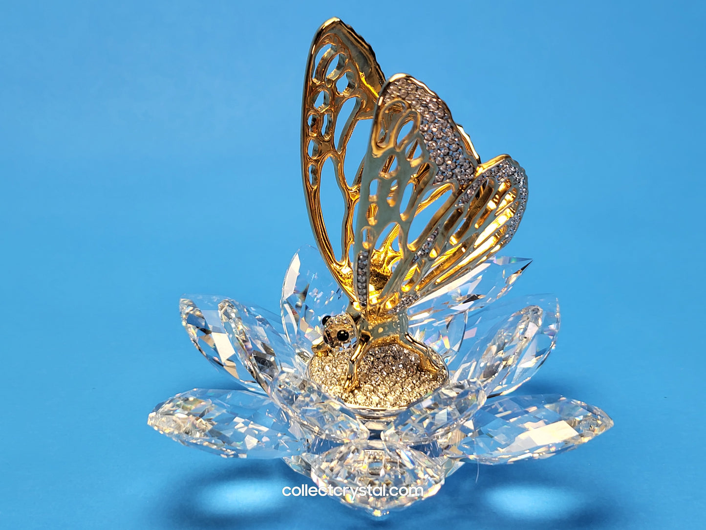 In Flight Gold Butterfly Flower # 7551 NR 100 or # 7551 100 000 MIB